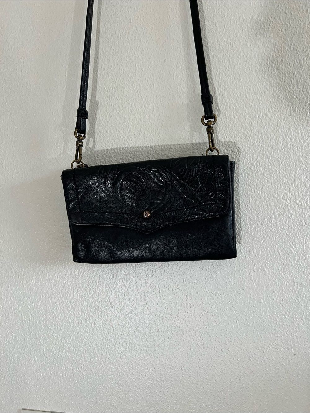 The Sak Black Leather Embossed Floral Crossbody